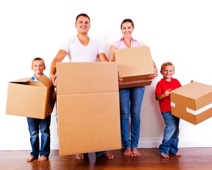 Office relocation planning in Shepherds Bush with moving boxes and desk setup