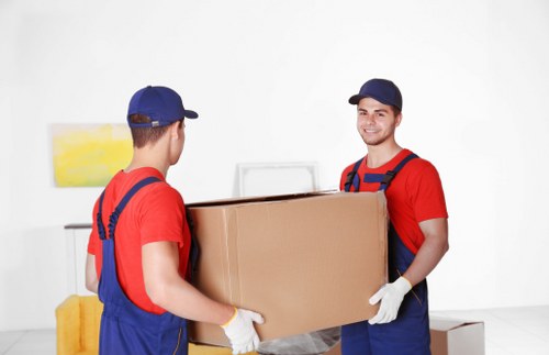 Careful loading of items before transport in Shepherds Bush