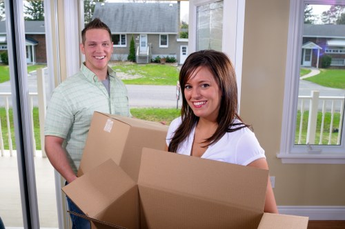 Professional movers handling a property move in West London