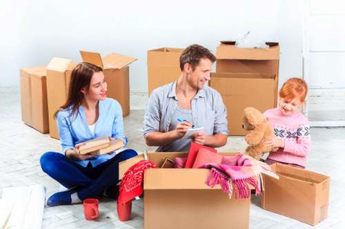 Office relocation planning in Shepherdsbush with packed boxes and office furniture