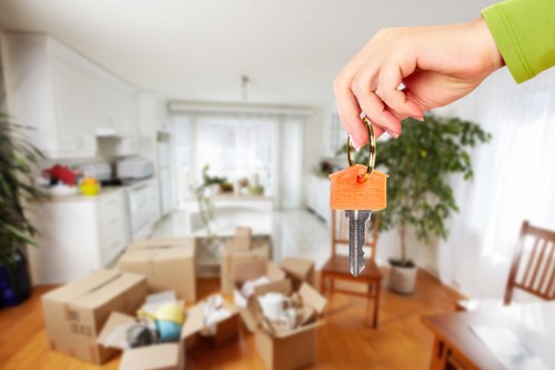 Professional movers handling business equipment during office removals in Shepherdsbush