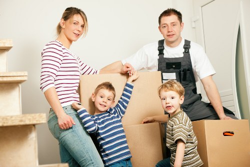Student removals team handling boxes and furniture for a Shepherds Bush move