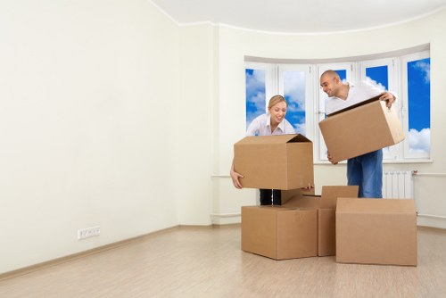 Workstations and office equipment being arranged during a Shepherds Bush office relocation
