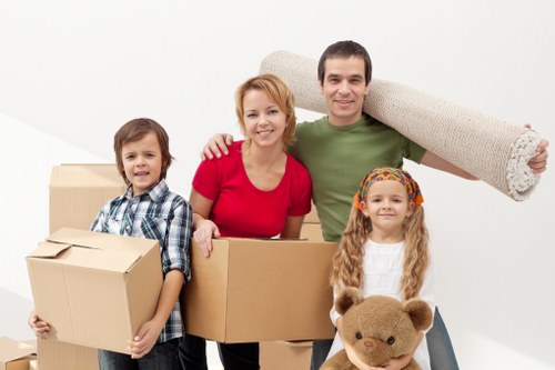 Careful loading of sofas and household furniture for a local move in west London