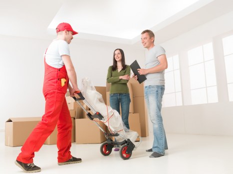 Local removal van transporting household items in Shepherdsbush