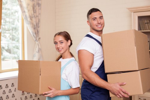 Packed boxes and furniture prepared for removal truck hire
