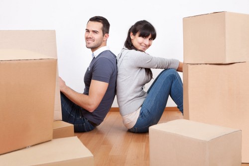 Loading boxes and furniture for a fast relocation in Shepherds Bush