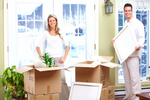 Packed boxes and wrapped household items ready for house removals in Shepherdsbush