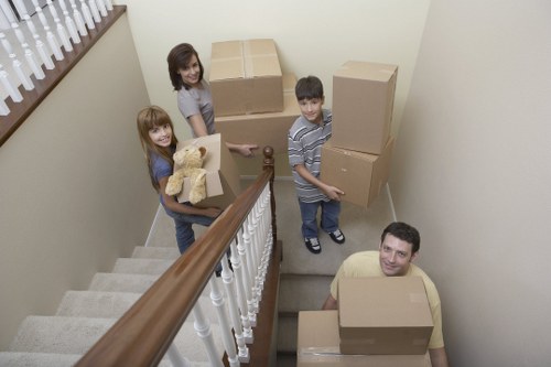 Loading furniture into a removal truck in Shepherdsbush